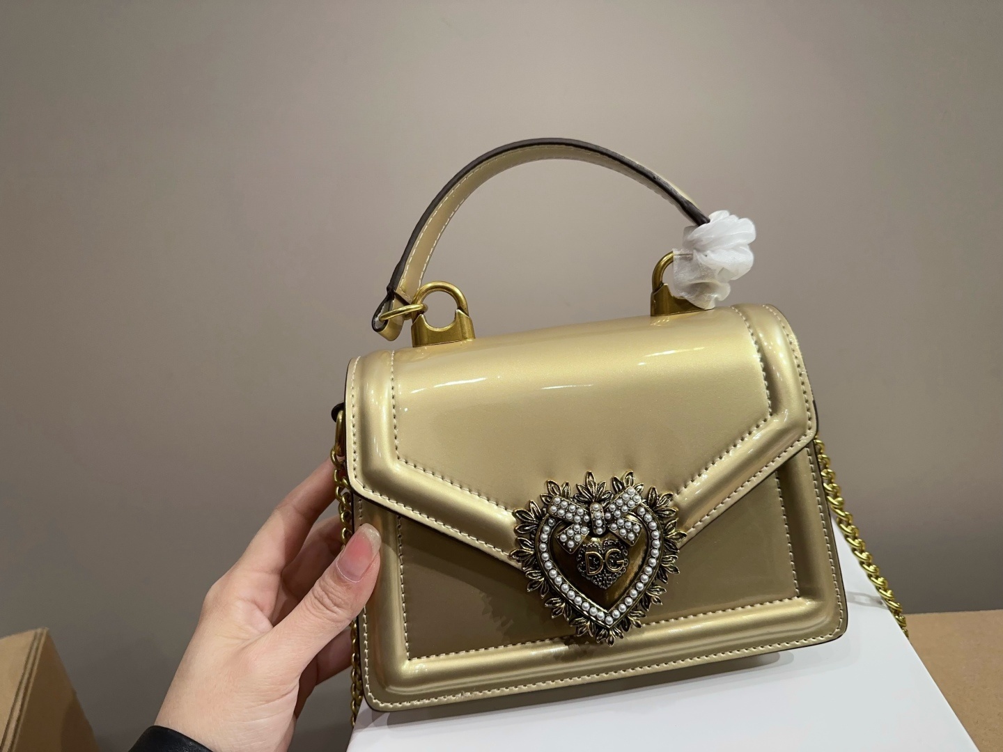 Dolce & Gabbana Handle chain bag with pearl heart clasp