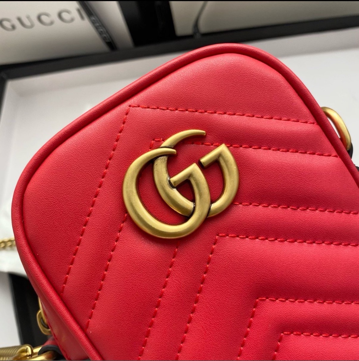 GUCCI GG Marmont mini quilted leather pouch