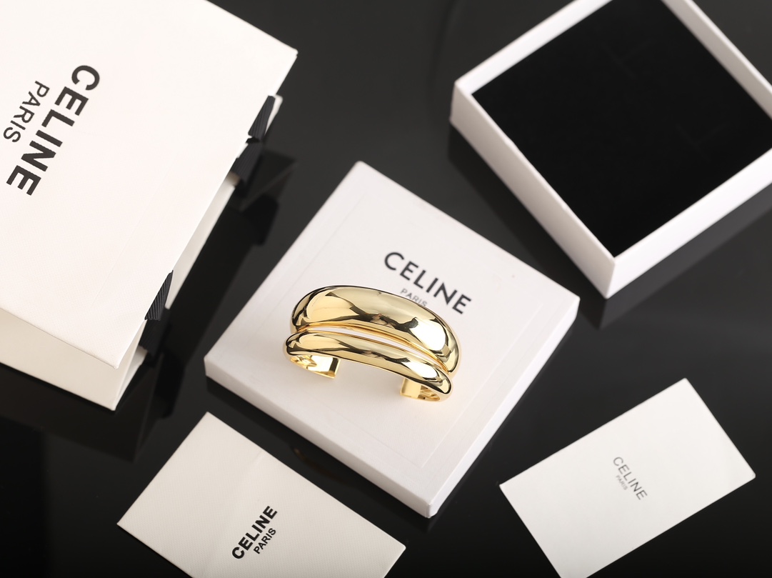 C*eline open earrings