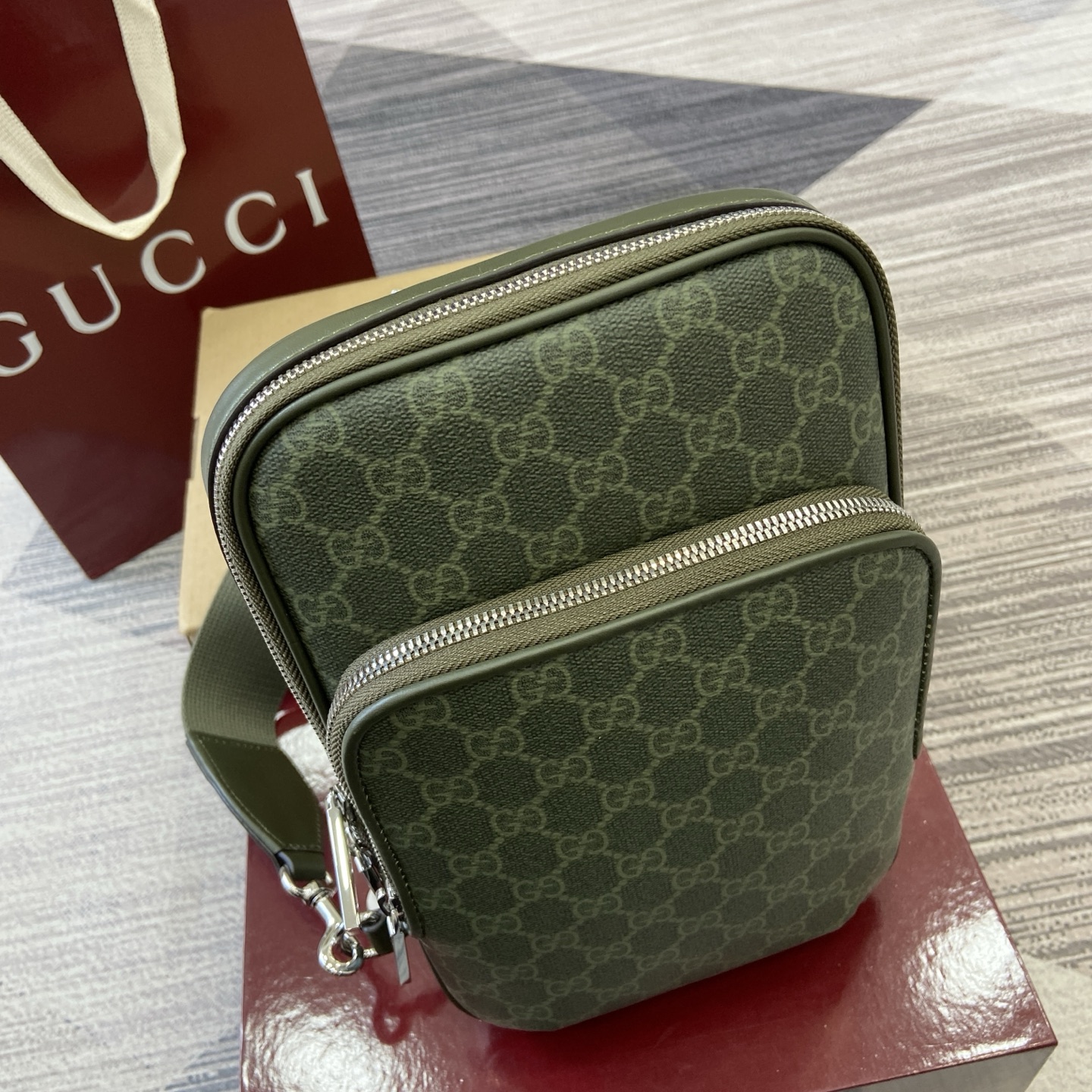 Gucci GG Monogram small slingbag