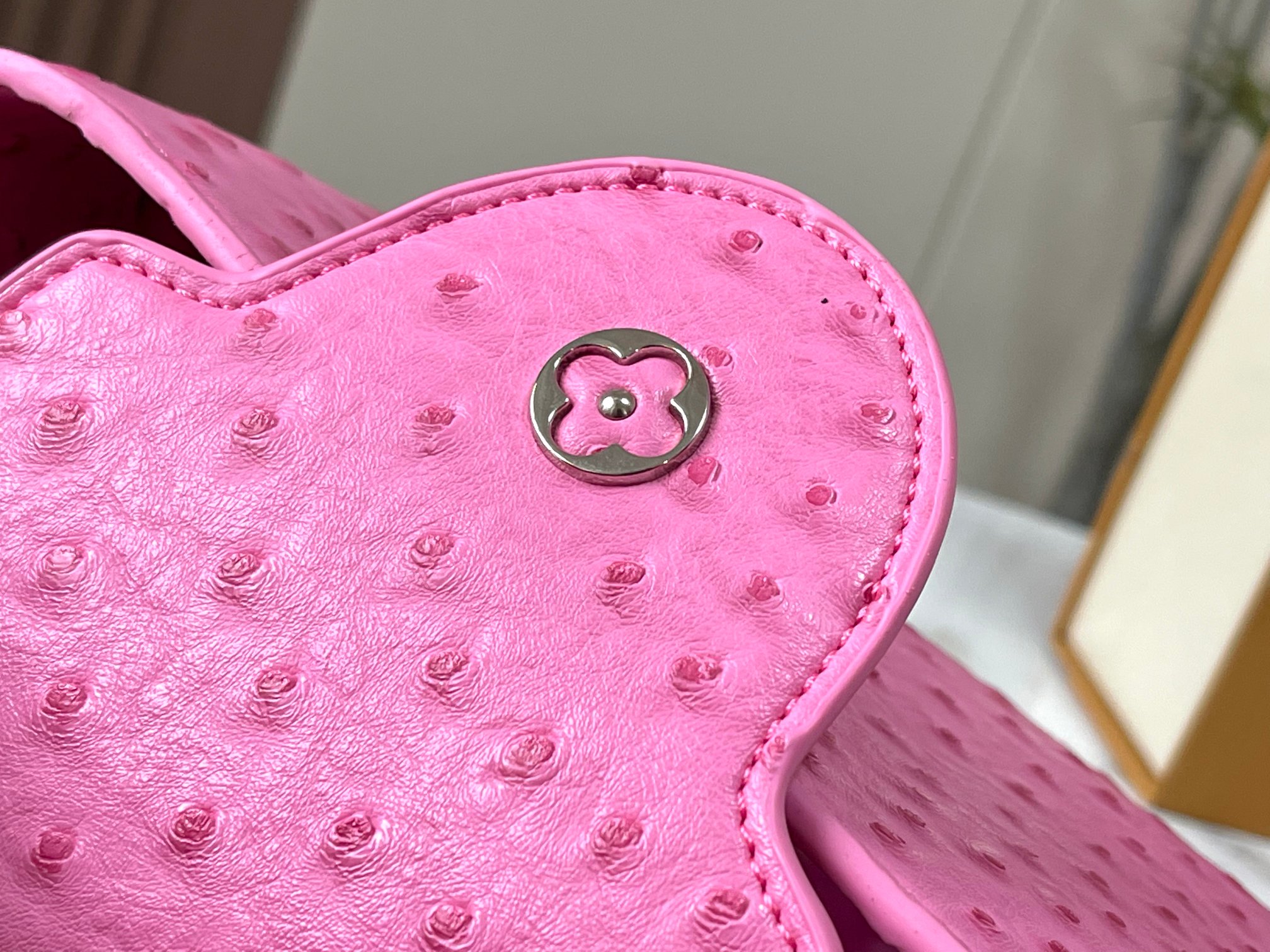 Capucines ostrich leather handbag