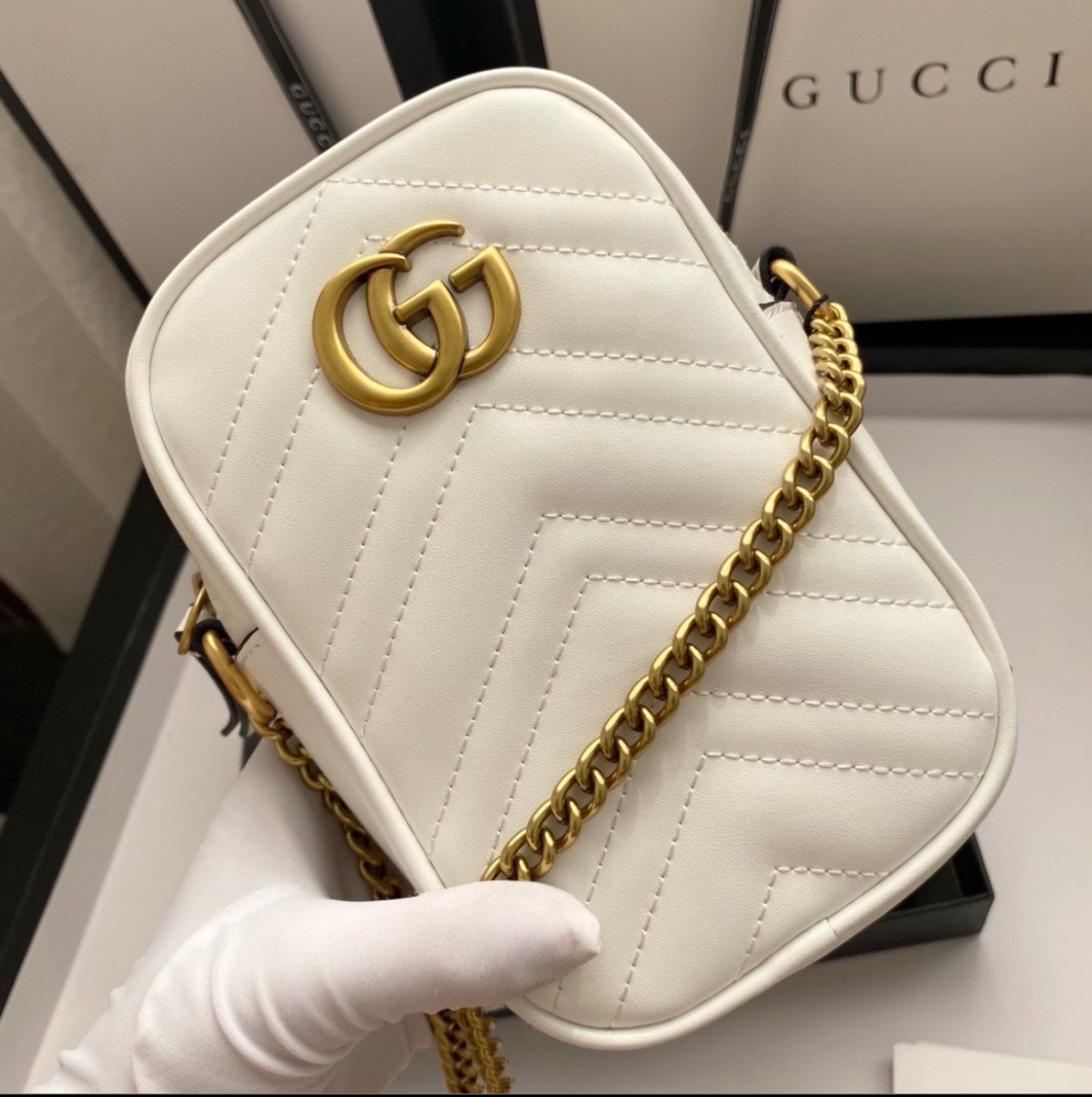 GUCCI GG Marmont mini quilted leather pouch