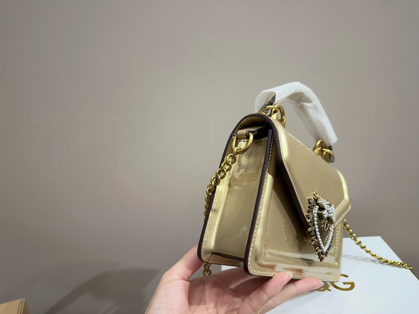 Dolce & Gabbana Handle chain bag with pearl heart clasp