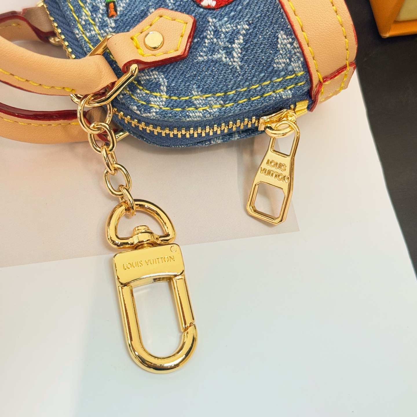 M02535 LV x TM Micro Denim Cerise Bag Charm