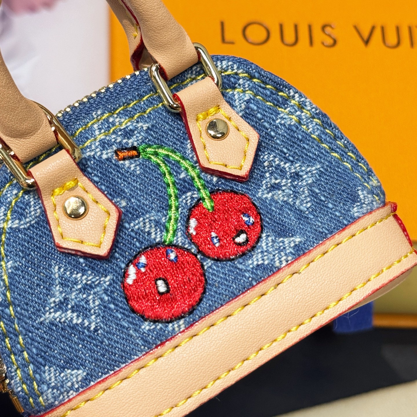 M02535 LV x TM Micro Denim Cerise Bag Charm