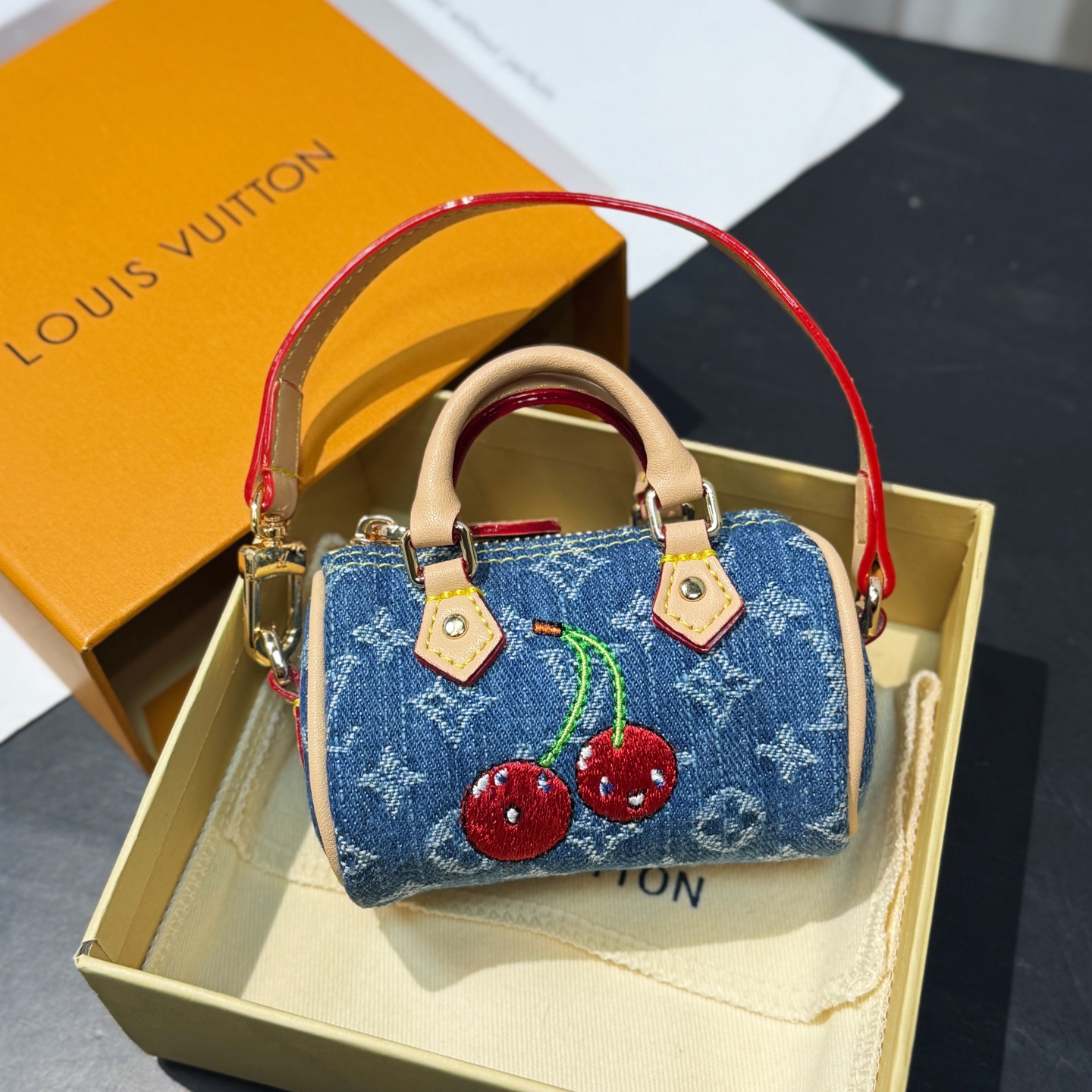 M02535 LV x TM Micro Denim Cerise Bag Charm