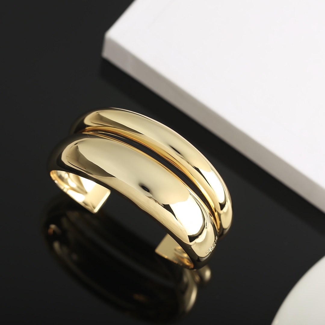 C*eline open earrings