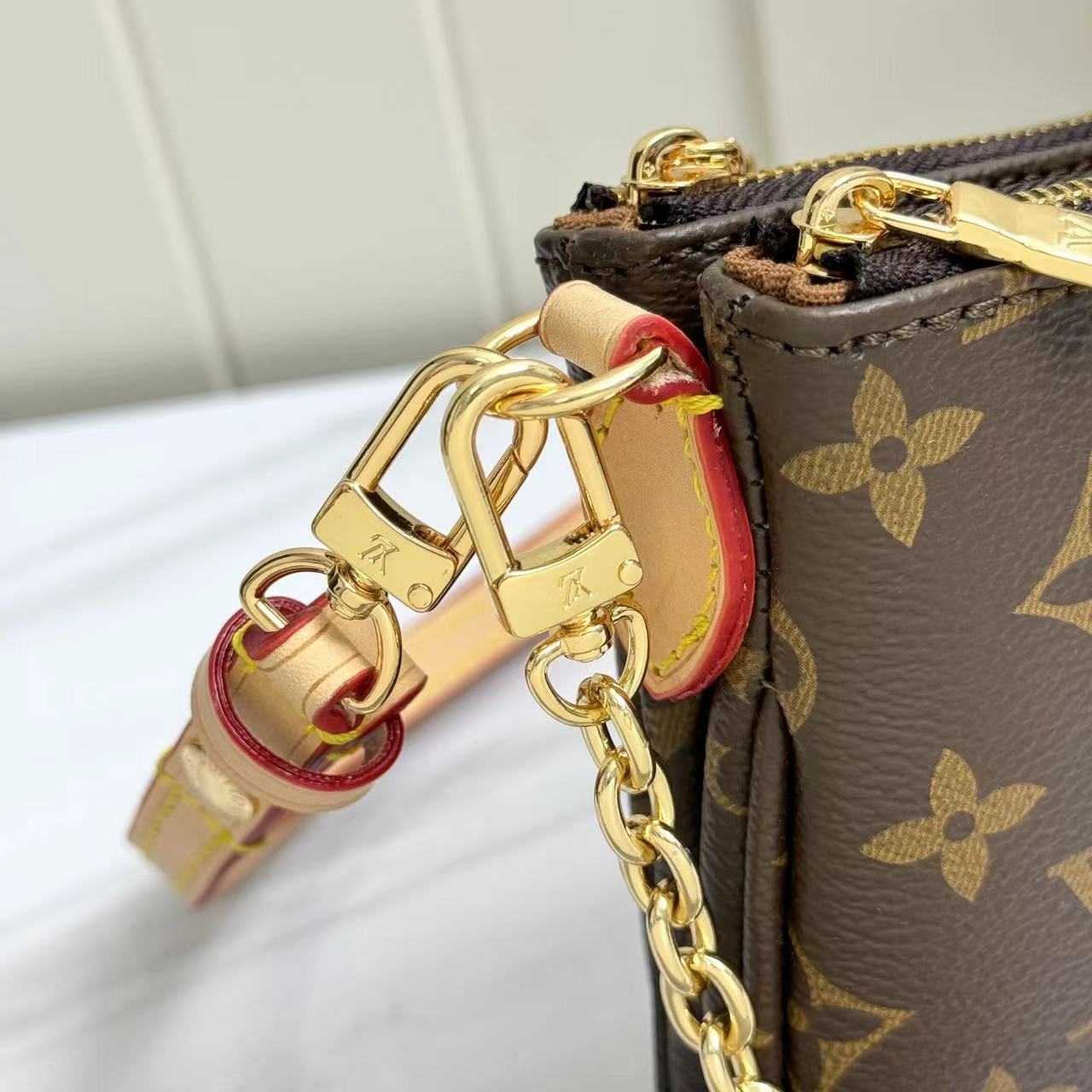 Louis Vuitton Monogram M83008 Liv Pochette