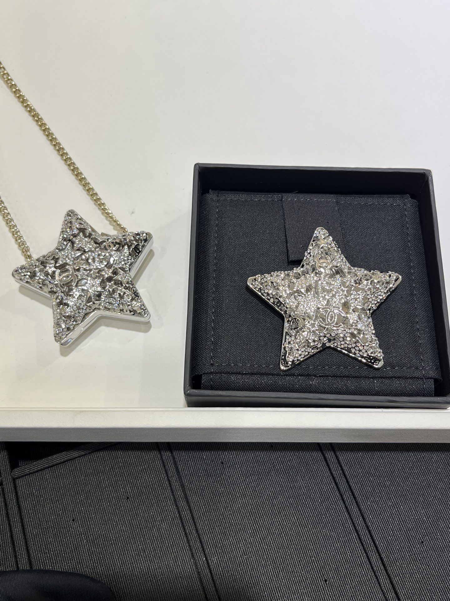 CHANEL Silver Hollow Star Brooch