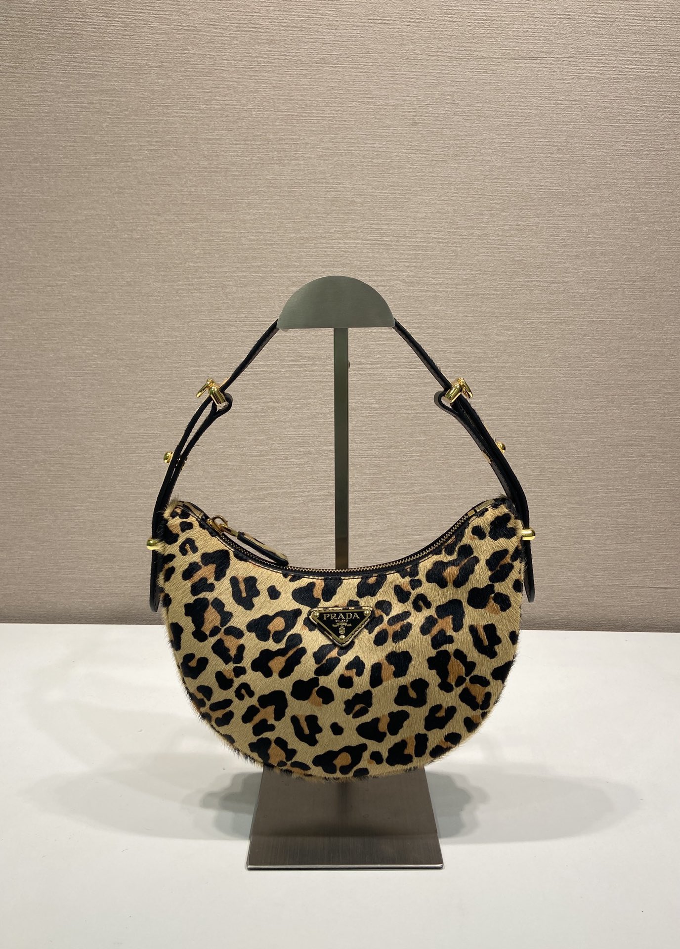 Prada Arqué leather shoulder bag leopard