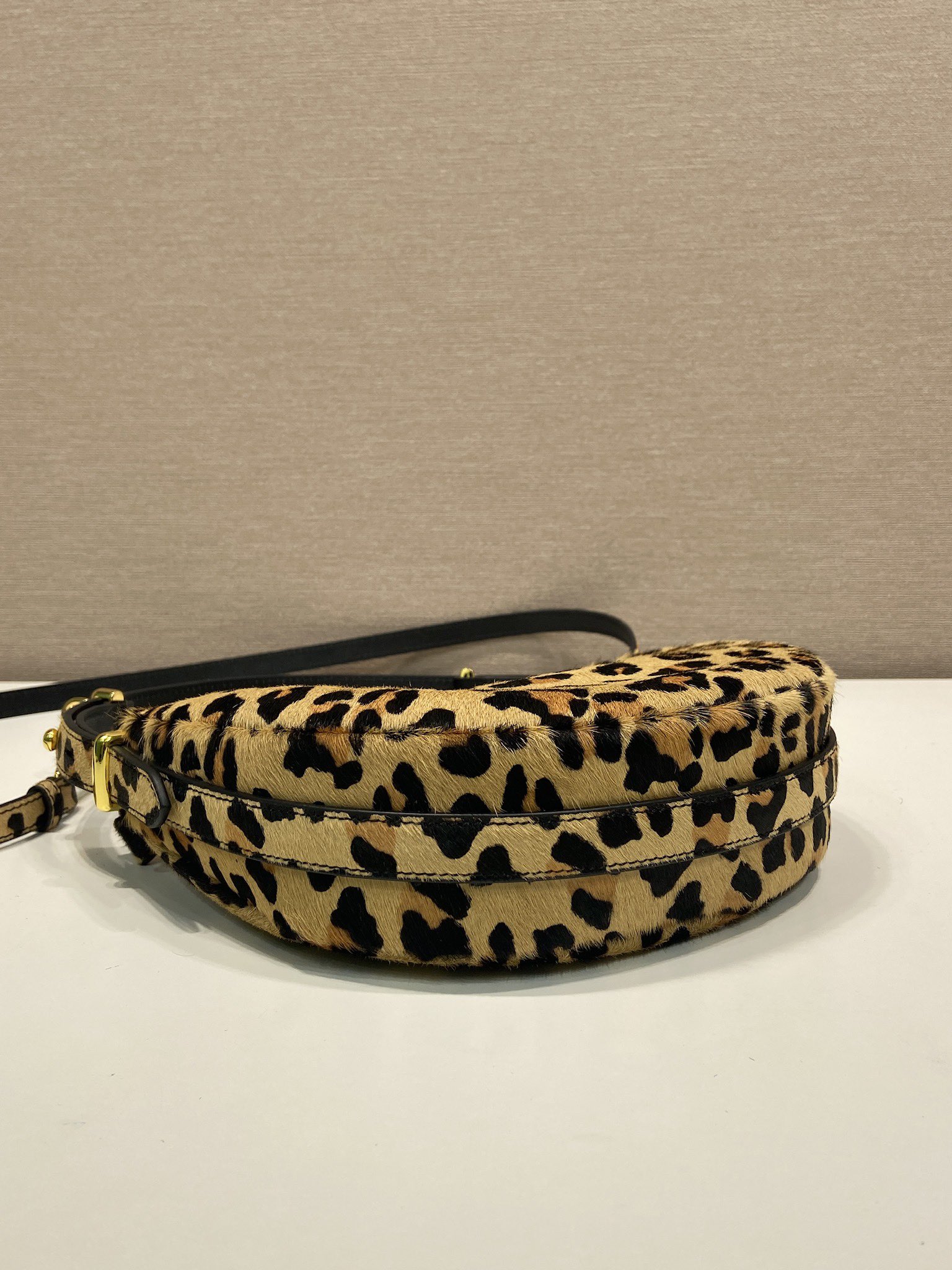 Prada Arqué leather shoulder bag leopard