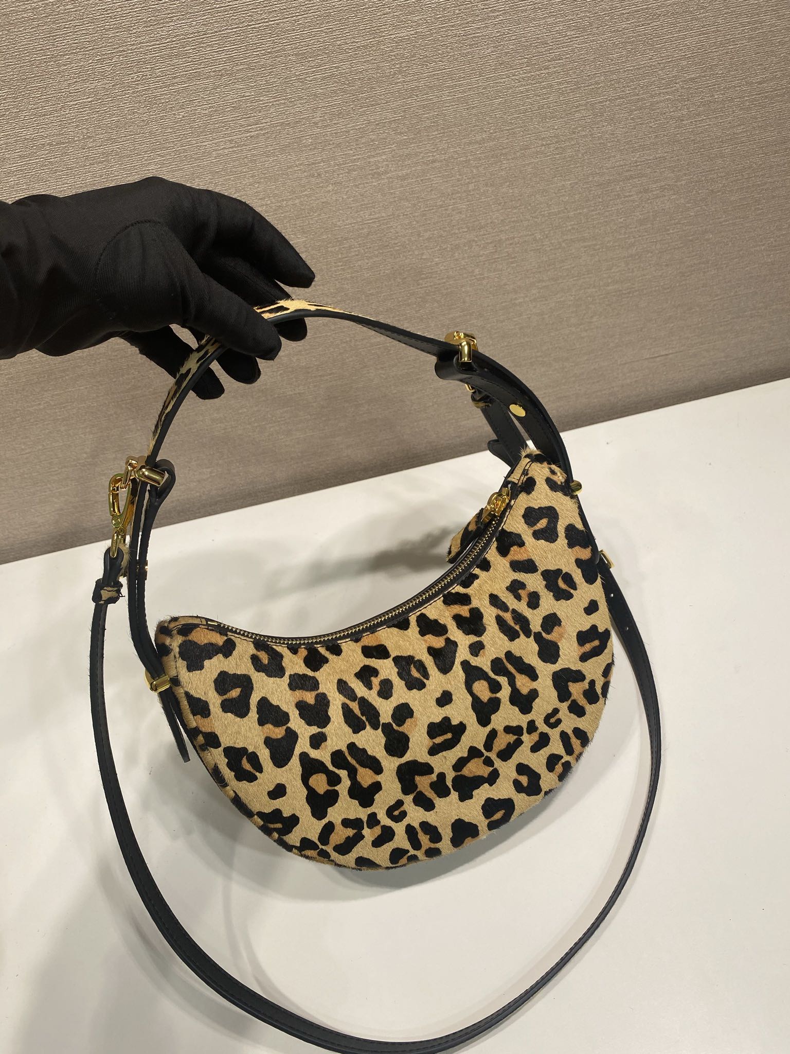Prada Arqué leather shoulder bag leopard