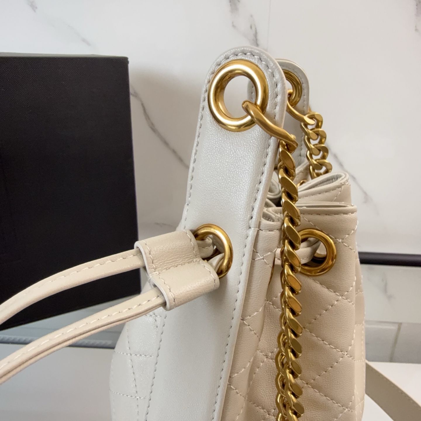 YSL Cassandre Bucket Bag In Lambskin 'Crema Soft'