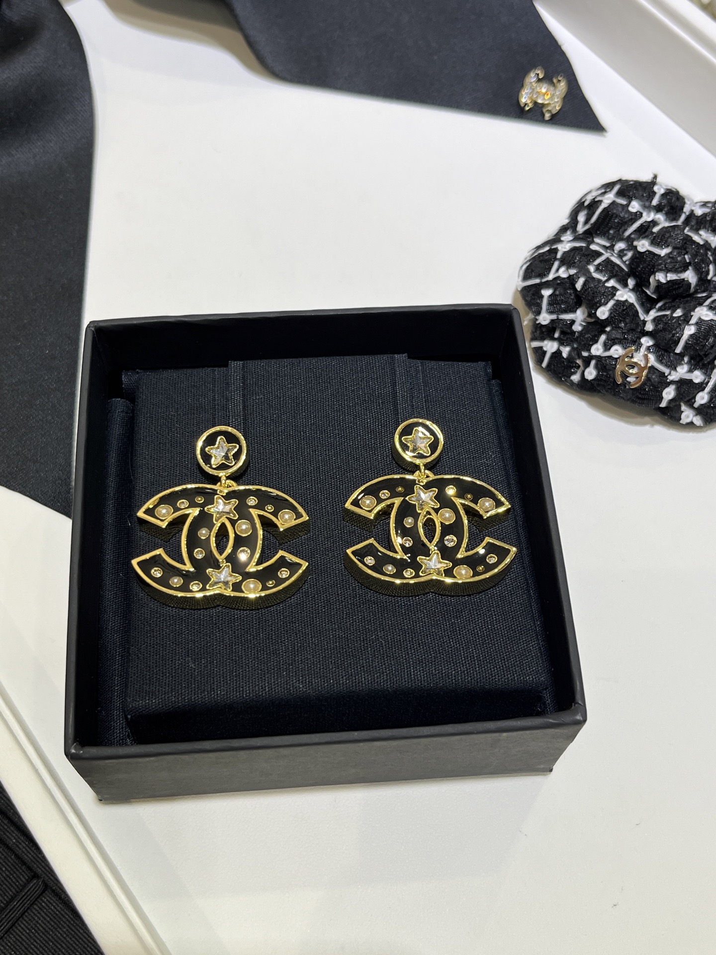 CHANEL Black Enamel Star Earrings