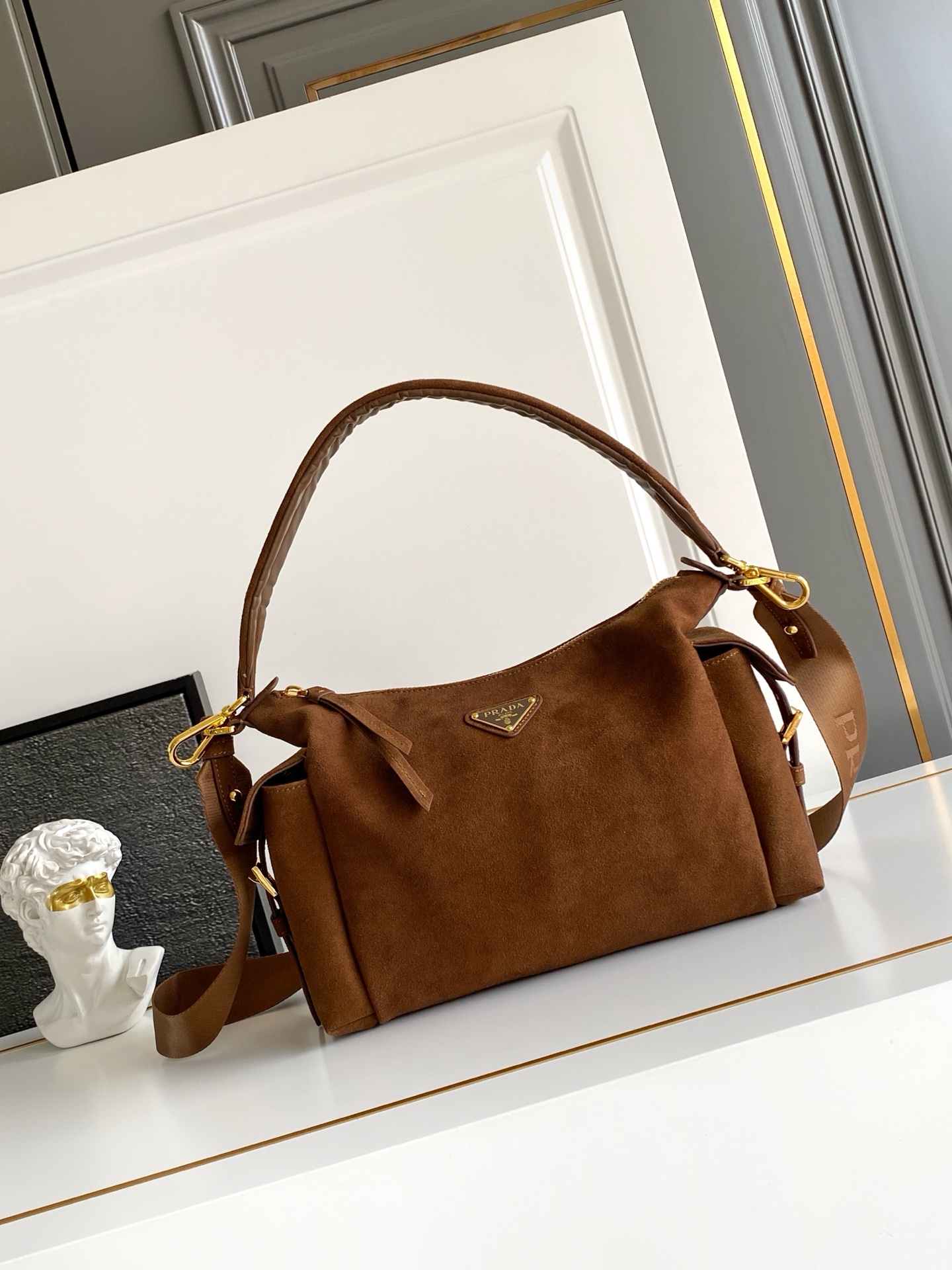 Prada Explore large suede bag