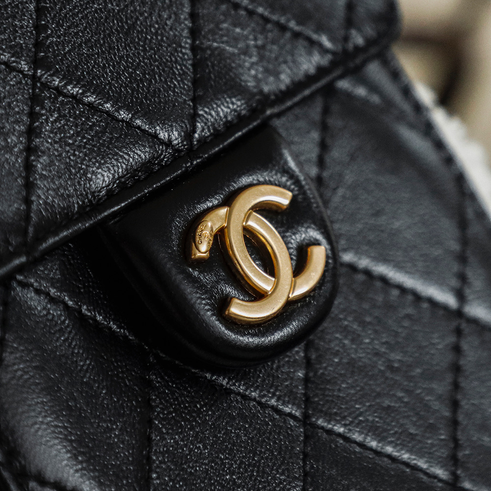 Chanel 25K Hobo Bag — Black Quilted Leather with Shearling Trim (Small)
