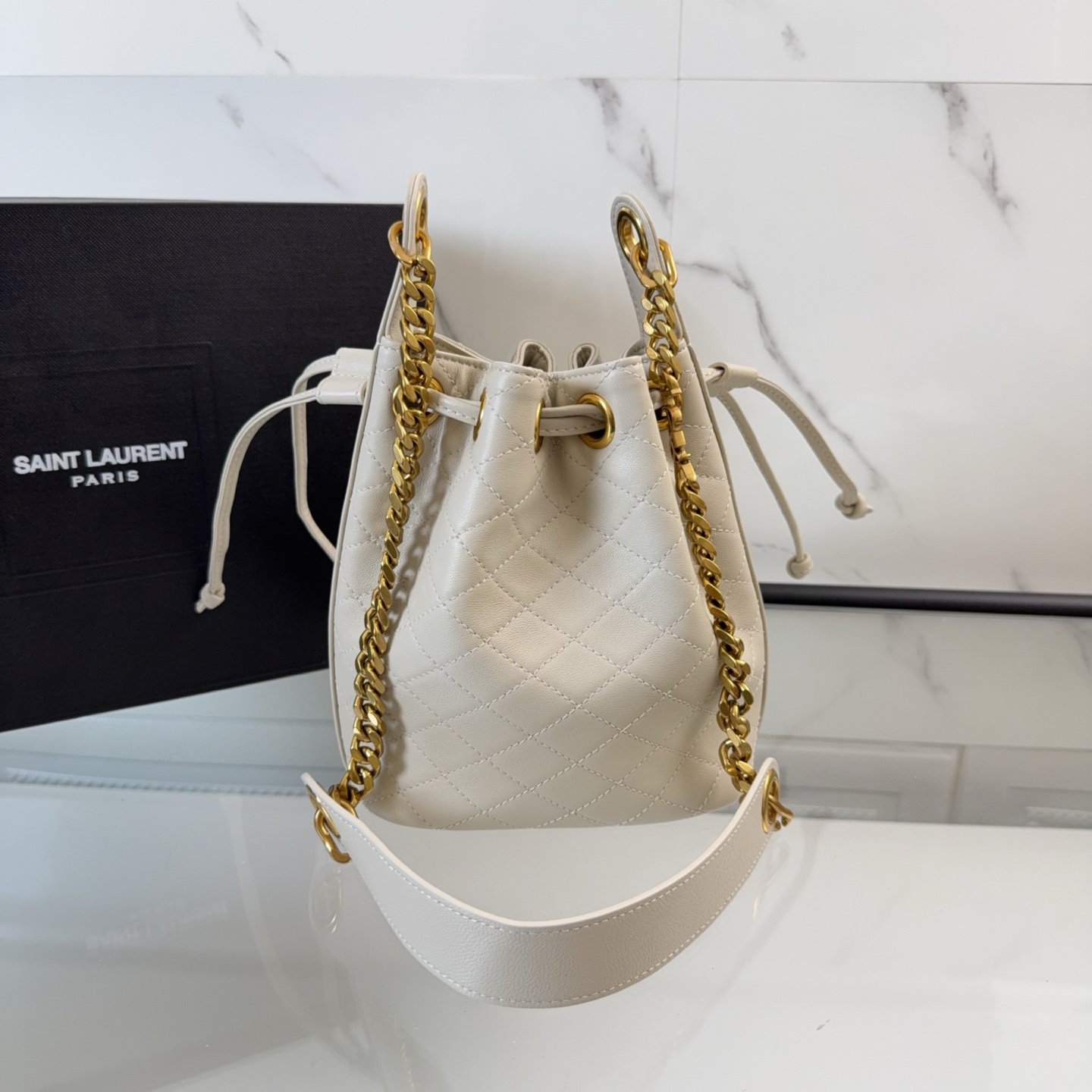 YSL Cassandre Bucket Bag In Lambskin 'Crema Soft'