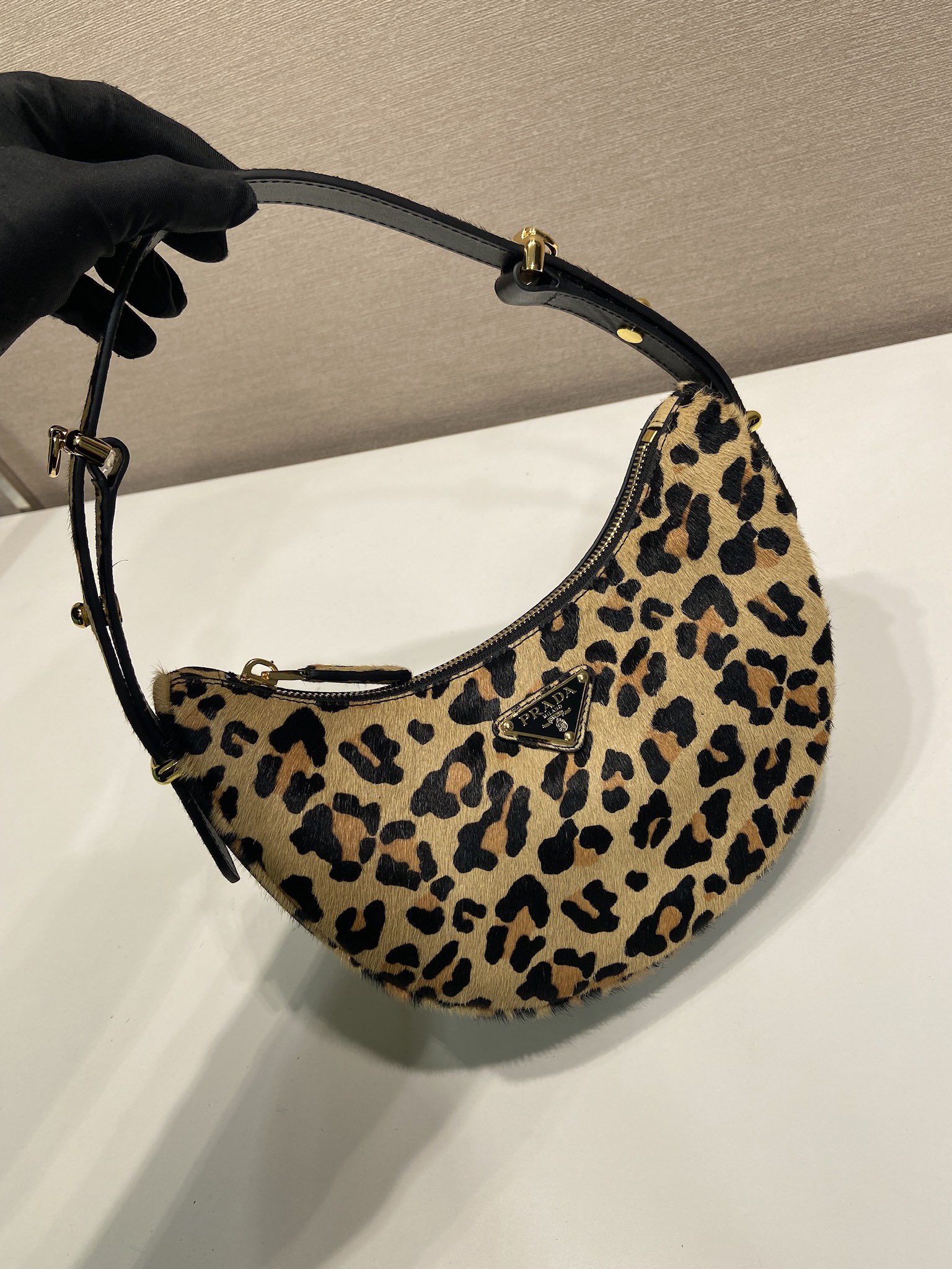 Prada Arqué leather shoulder bag leopard