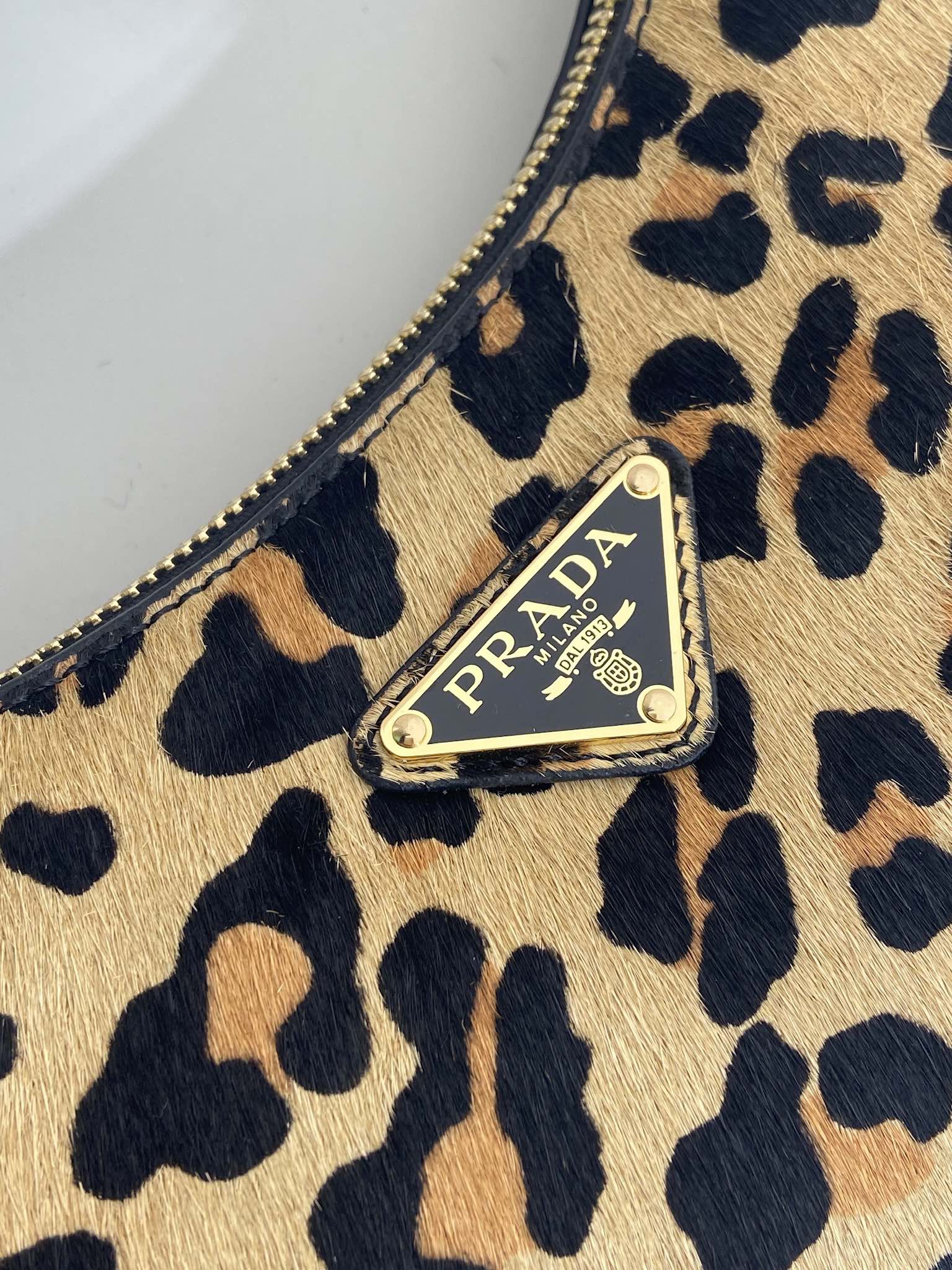 Prada Arqué leather shoulder bag leopard