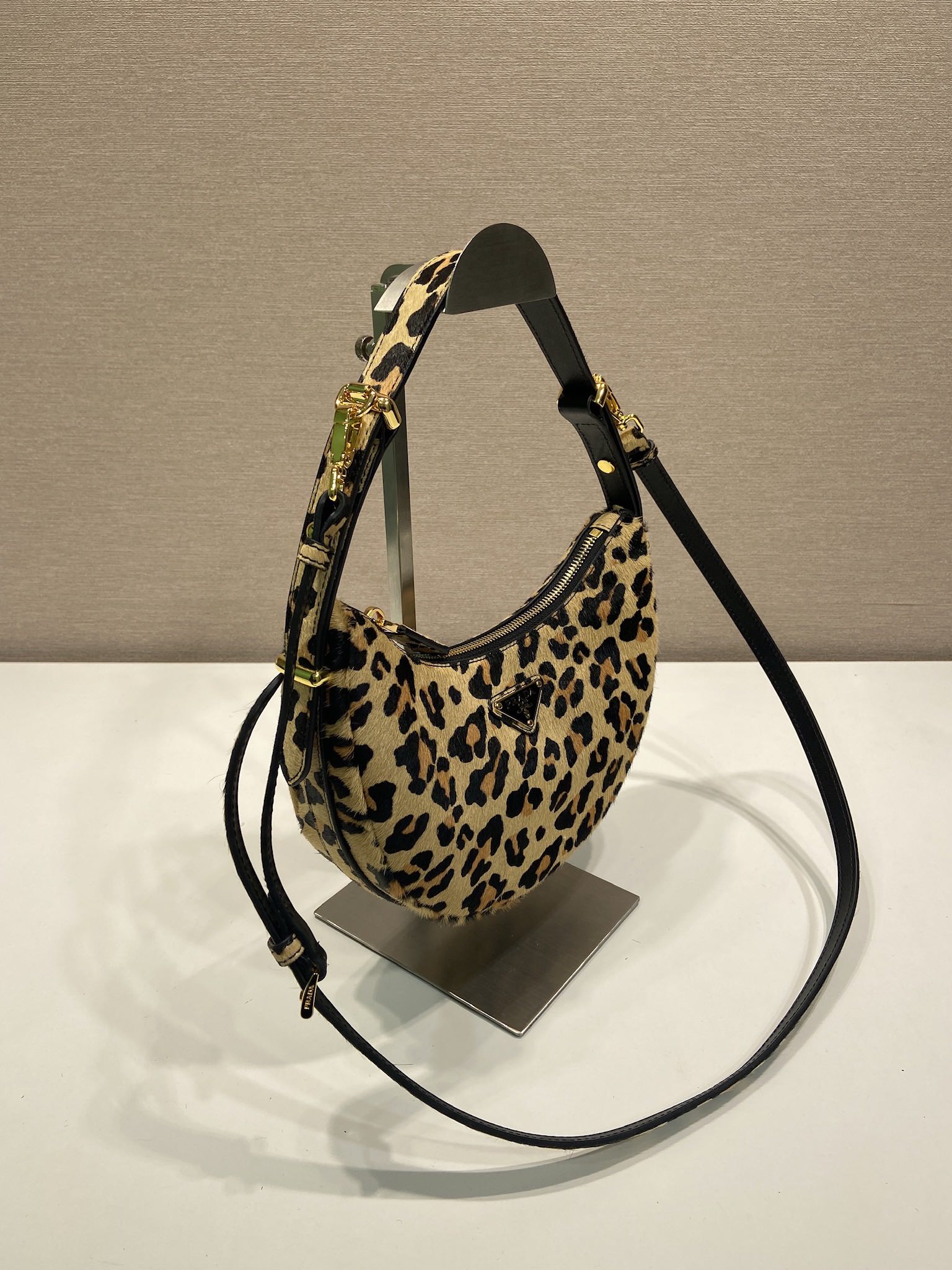 Prada Arqué leather shoulder bag leopard
