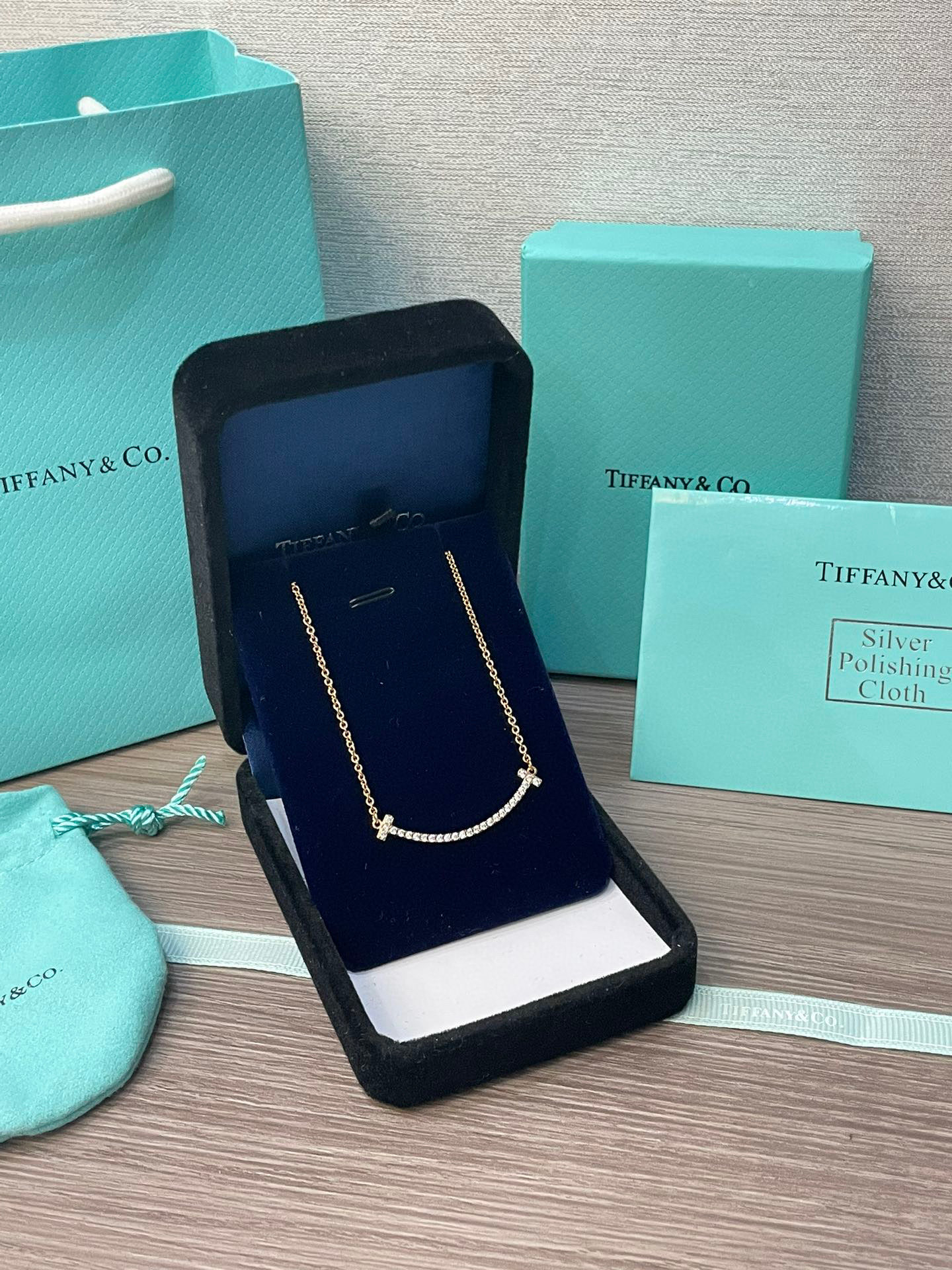 Tiffany Medium Smile Pendant in Gold with Diamonds