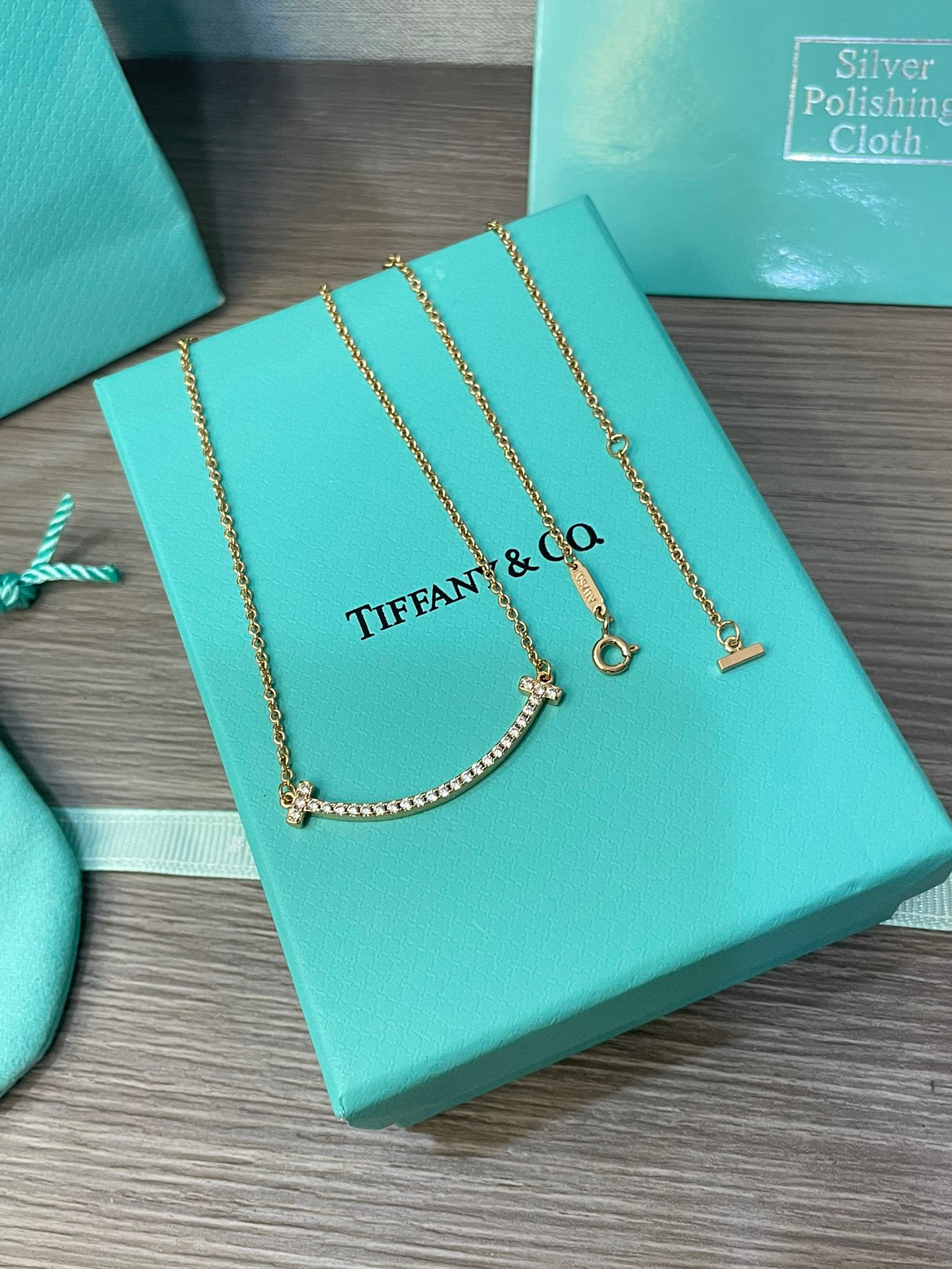 Tiffany Medium Smile Pendant in Gold with Diamonds