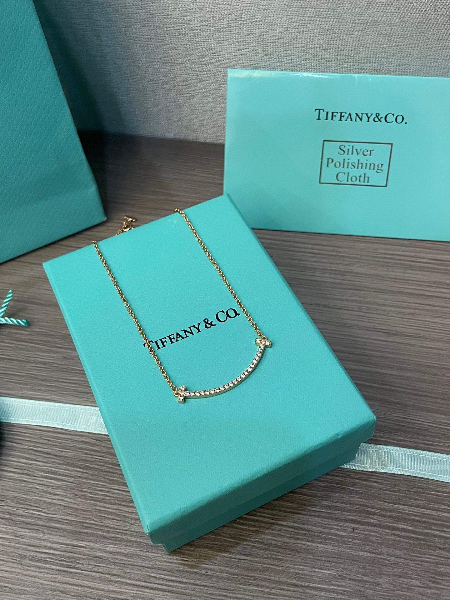 Tiffany Medium Smile Pendant in Gold with Diamonds