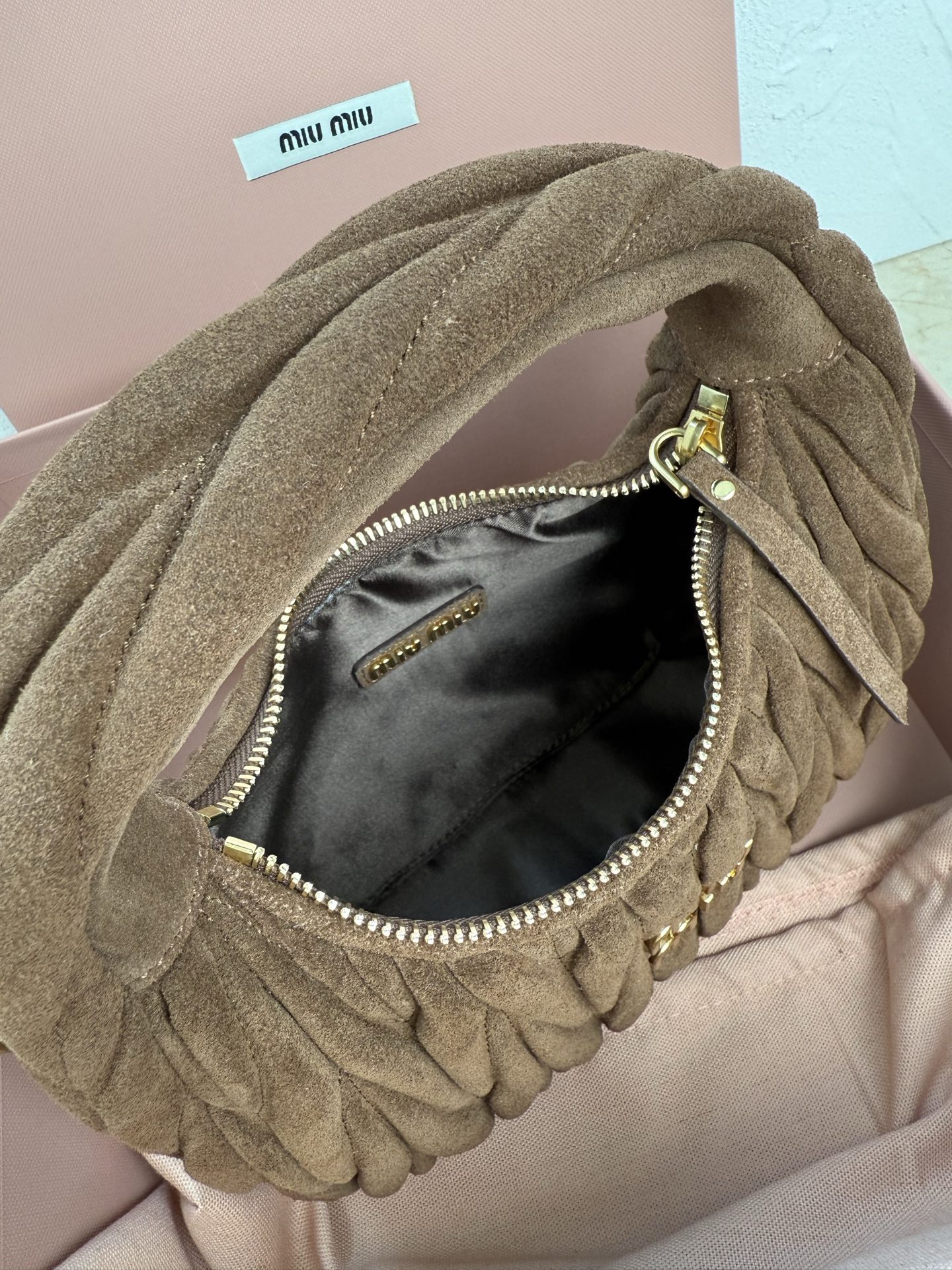 MiuMiu Wander matelassé suede bag