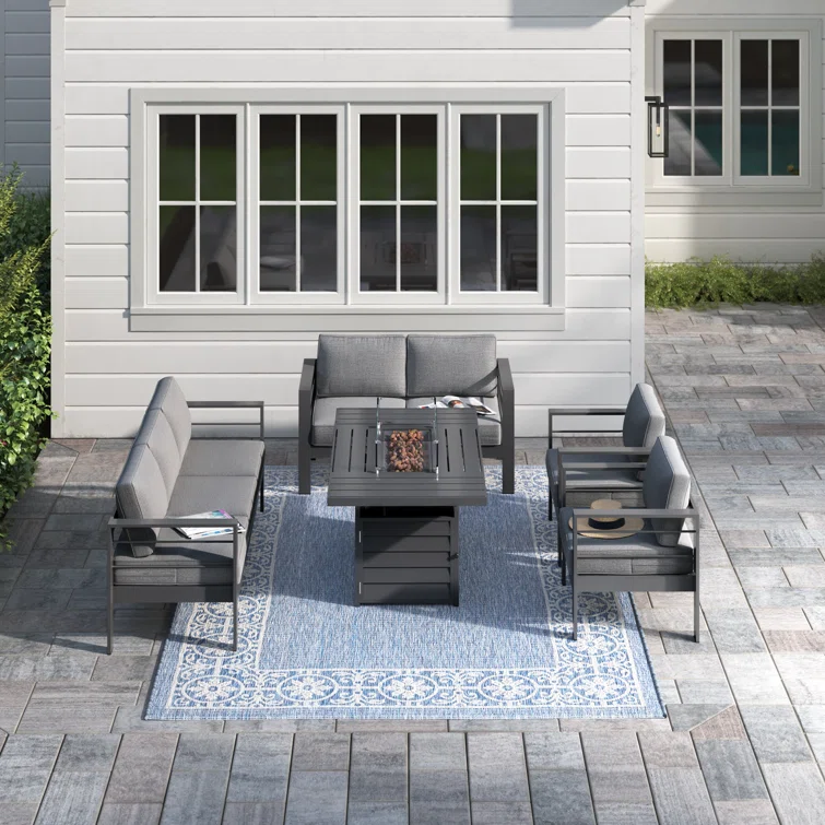 Brandtley 7 - Person Sofa Seating Group with Cushions and Fire Pit Table