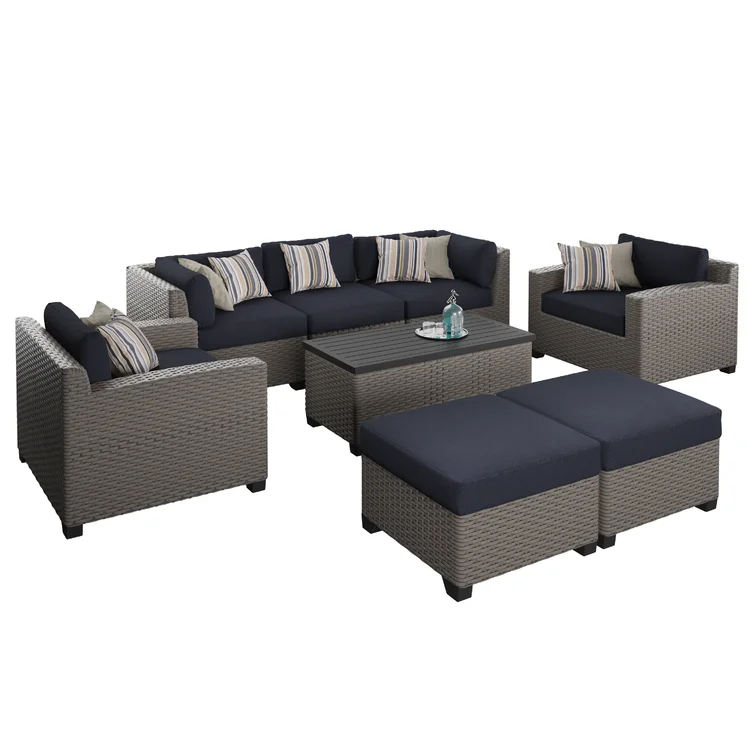 Amjad 8 Piece Outdoor Sectional Seating Group with Cushions