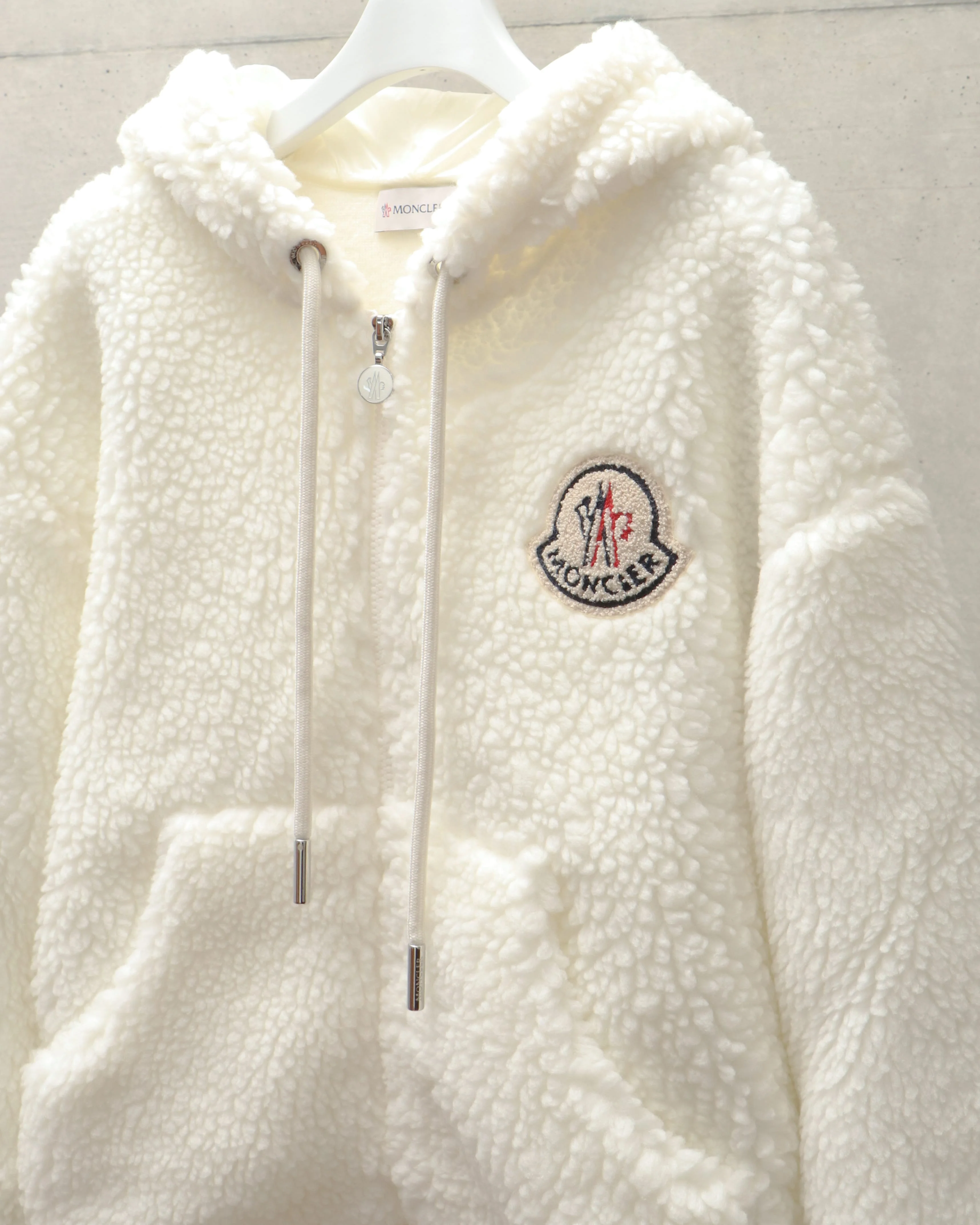 MAGLIA APERTA CON ZIP