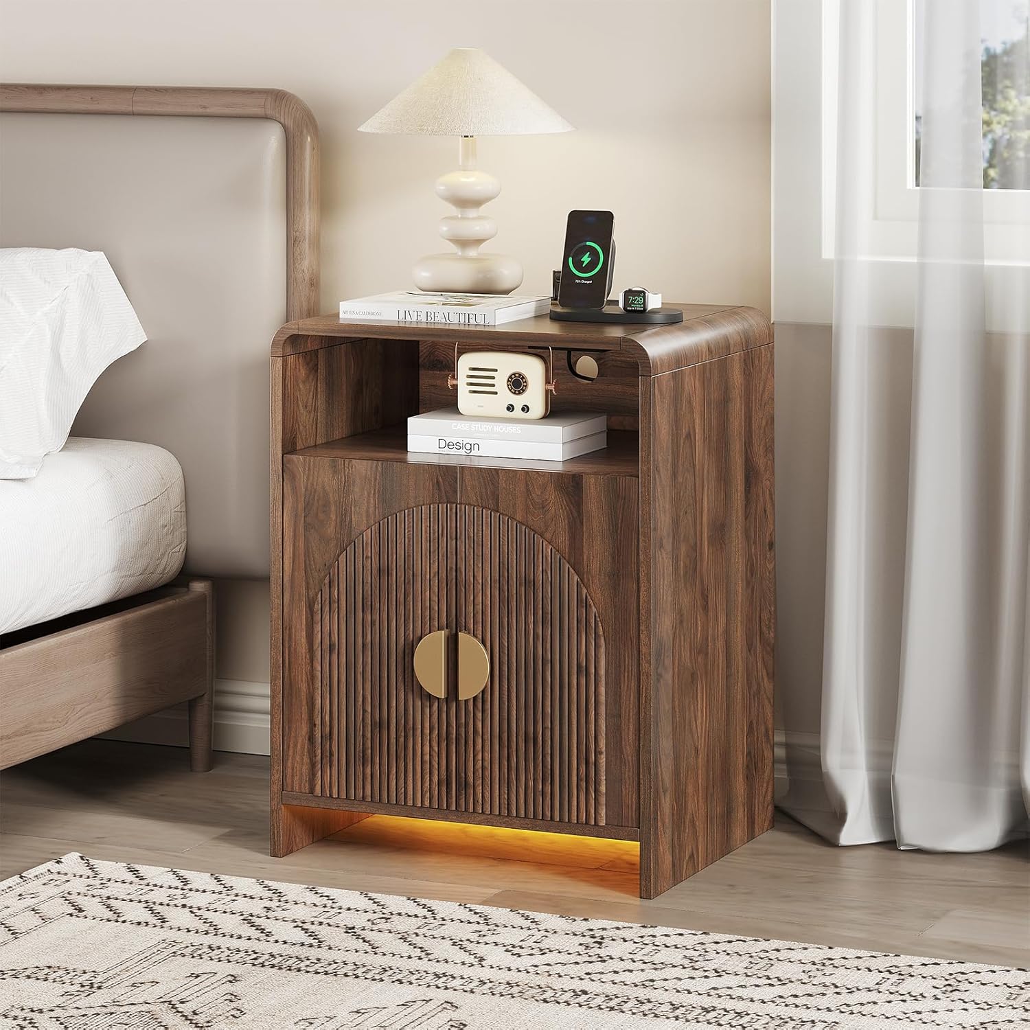 The bedside table is equipped with a charging station and LED lights. The bedside table can be adjusted to a storage compartment. The modern side table has recessed doors and open storage space. Bedroom, living room,