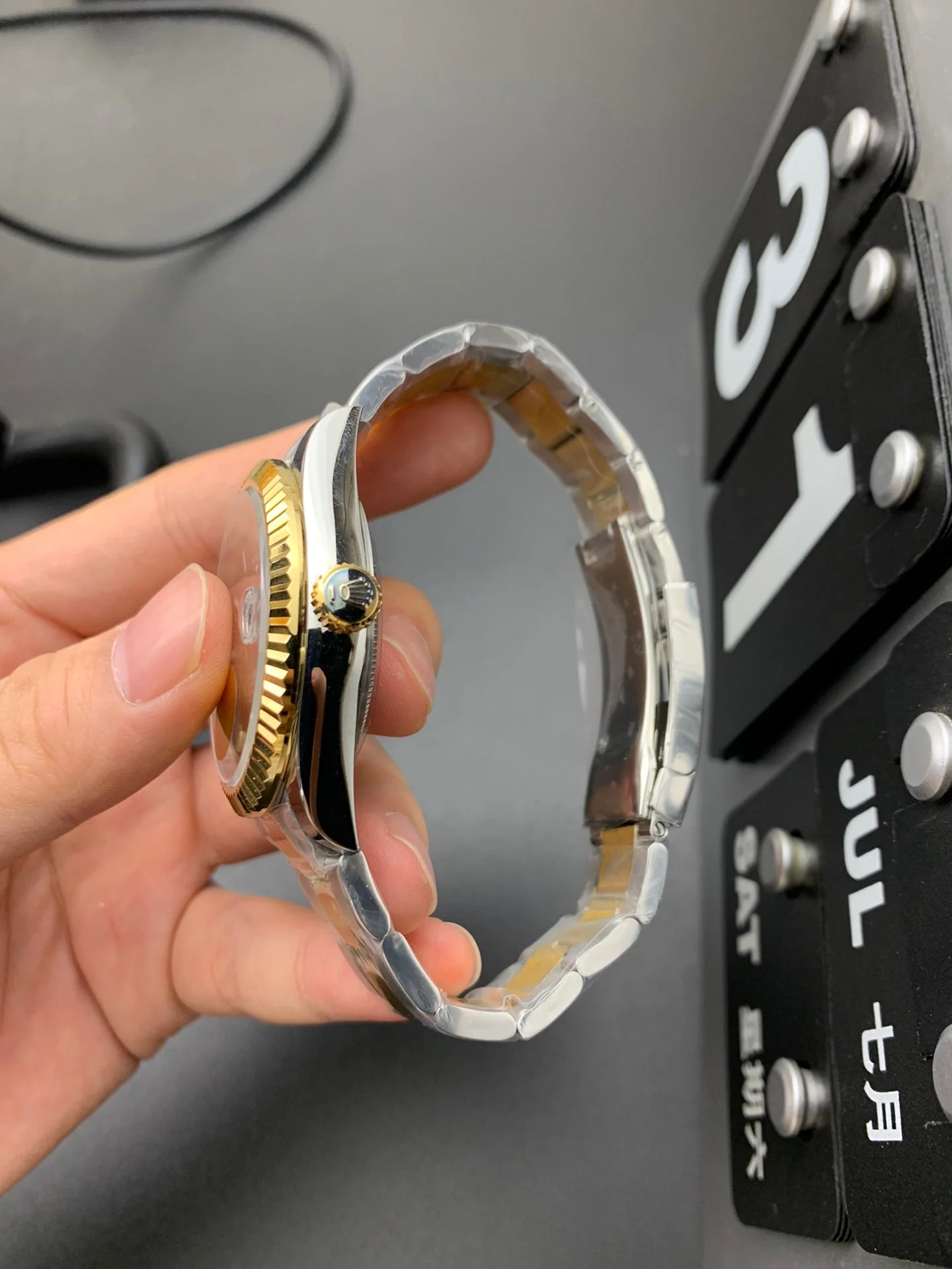 SKY DWELLER GOLD STEEL BLACK DIAL