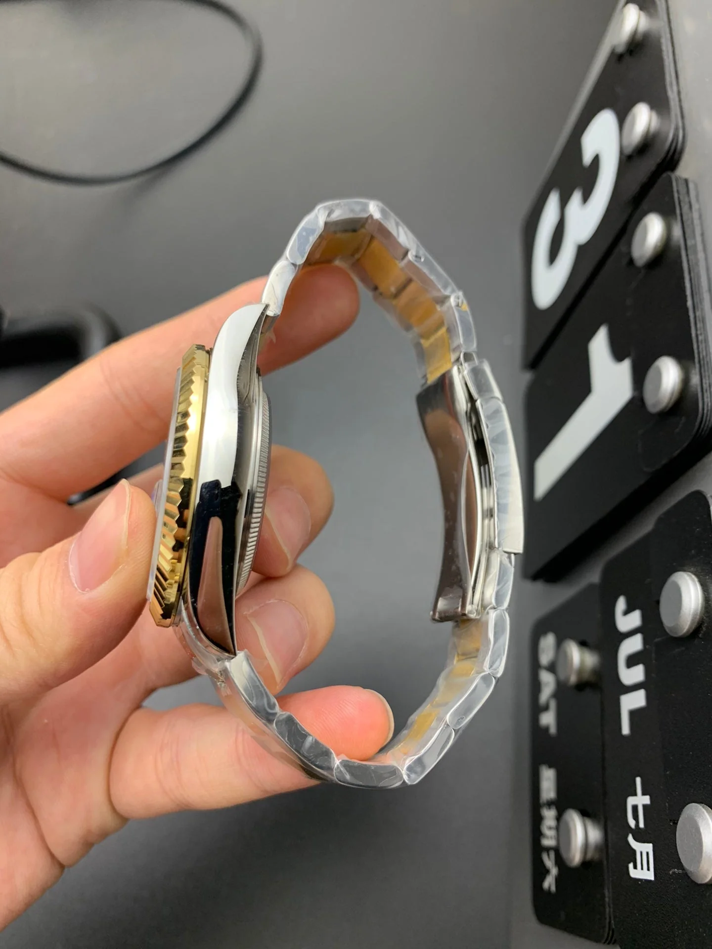 SKY DWELLER GOLD STEEL BLACK DIAL