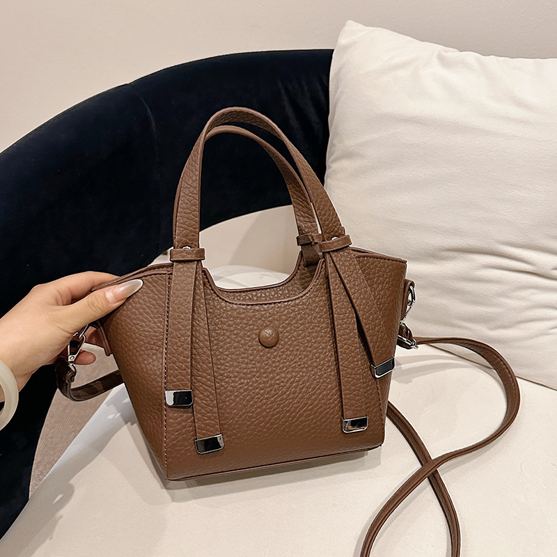 igh Luxury Fashionable Hand-Held Bucket Bag For Women 2026 New High-End Texture Versatile Casual Commuting Crossbody Bag